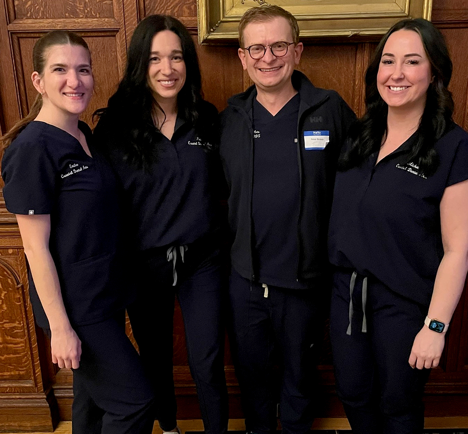 dr peter with his dental team